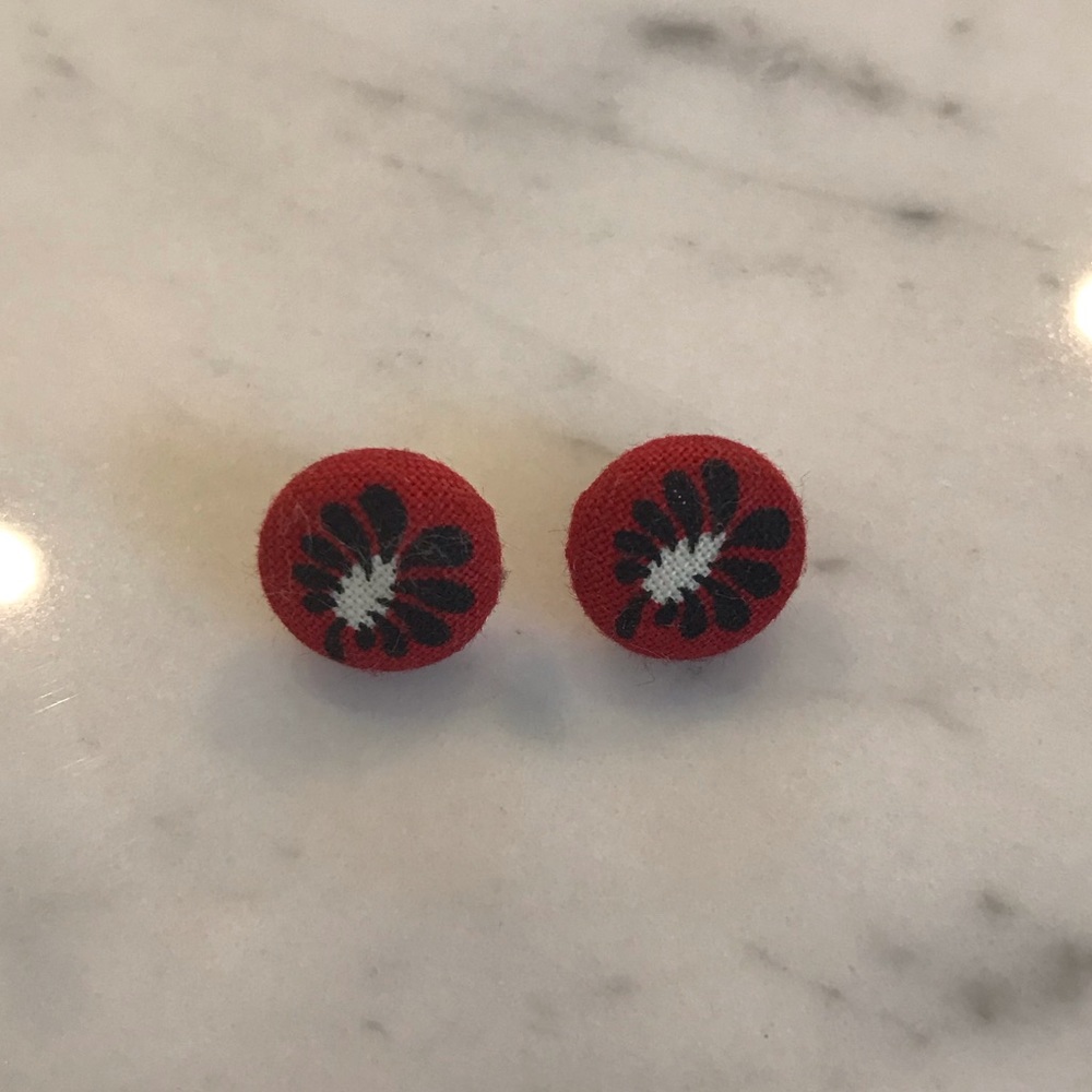 Small red and black studs